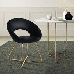 Eetkamerstoel met ronde open rugleuning zwart fluweel met goudkleurige metalen poten ML design