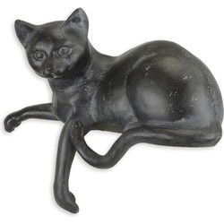 A RESIN FIGURINE OF A RECLINING CAT