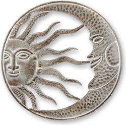 AN IRON WALL DECORATION OF THE SUN AND MOON