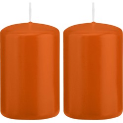 2x Kaarsen oranje 5 x 8 cm 18 branduren sfeerkaarsen - Stompkaarsen