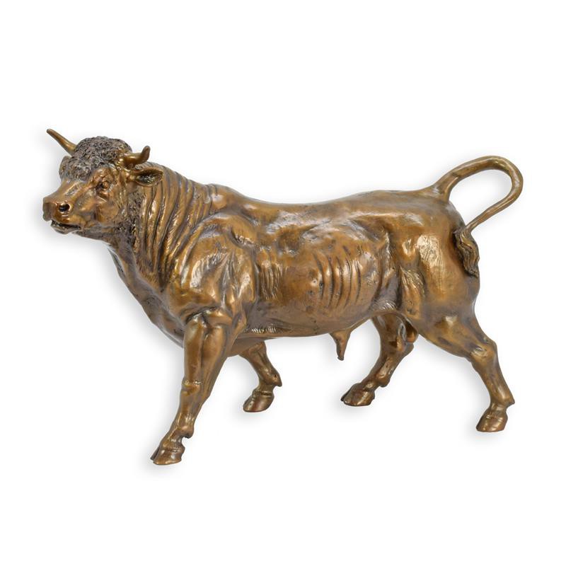 A BRONZE SCULPTURE OF A BULL - 