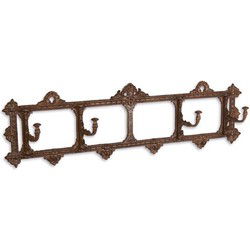 A BROWN CAST IRON COAT HOOK