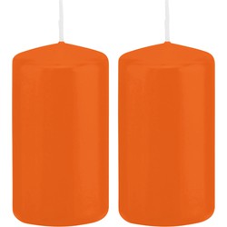 2x Kaarsen oranje 6 x 12 cm 40 branduren sfeerkaarsen - Stompkaarsen