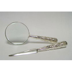 A MAGNIFYING-GLASS AND LETTER KNIFE