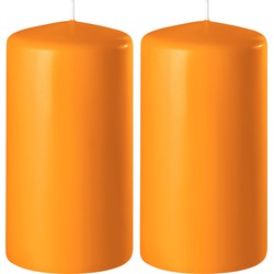 2x Kaarsen oranje 6 x 10 cm 36 branduren sfeerkaarsen - Stompkaarsen