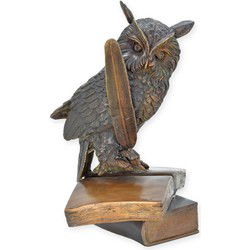 A BRONZE SCULPTURE OF THE WISE OWL WITH BOOKS