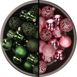 Kunststof kerstballen 74x stuks donkergroen en roze 6 cm - Kerstbal