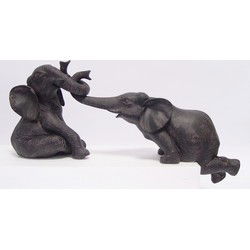 A PAIR OF RESIN ELEPHANTS