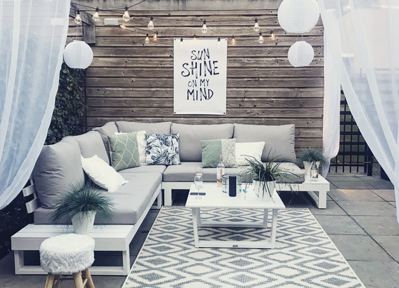 Stylingtip: tuinposters maken je tuin nog net iets mooier