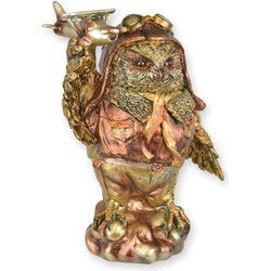 A RESIN STEAMPUNK FIGURINE OF AN OWL WITH AIRPLANE