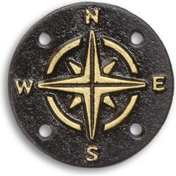 A CAST IRON COMPASS PLAQUE