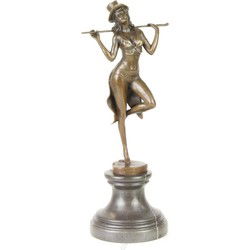 A BRONZE SCULPTURE OF A REVUE DANCER