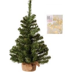 Volle kerstboom in jute zak 60 cm inclusief warm witte kerstverlichting - Kunstkerstboom