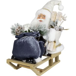 Kerstman beeld - H45 cm - wit - zittend op slee - kerstpop - Kerstman pop