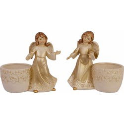 A PAIR OF FIGURAL PORCELAIN TEA LIGHT HOLDERS