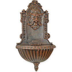 A CAST IRON WALL FOUNTAIN