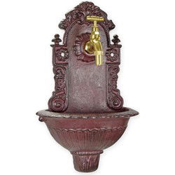 A CAST IRON WALL FOUNTAIN