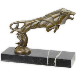A BRONZE CAR MASCOT OF A LEAPING LION