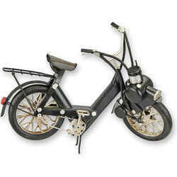 A TIN MODEL OF A SOLEX