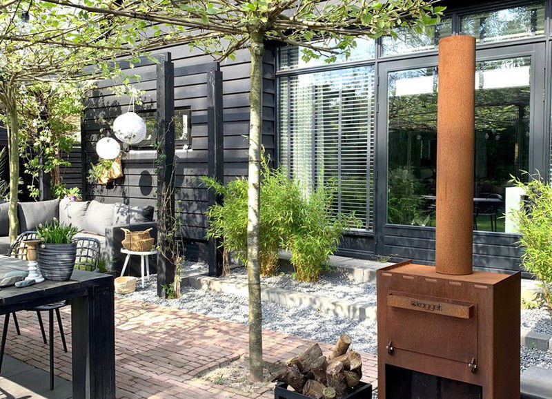 Zo zit je er 's avonds ook nog lekker warm bij in de tuin