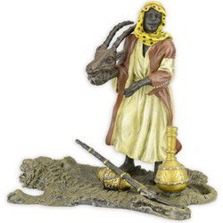 A BRONZE SCULPTURE OF AN ARAB HUNTER
