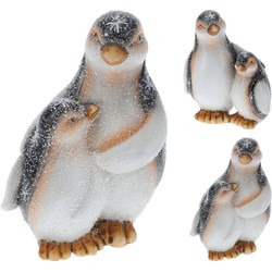 Pinguins ouder en kind staand kerstversiering