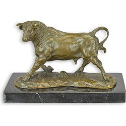 A BRONZE FIGURINE OF A BULL