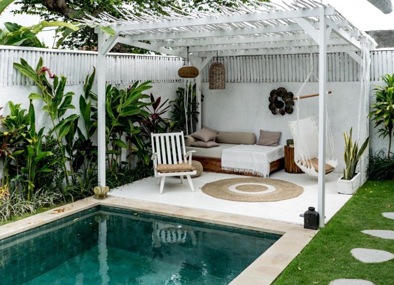 Wegzwijmelen: 9x prachtige tuinen met een zwembad