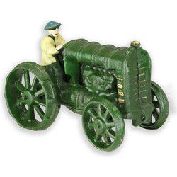 Gietijzeren model van een kleine groene tractor