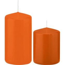 Stompkaarsen set van 4x stuks oranje 8 en 12 cm - Stompkaarsen