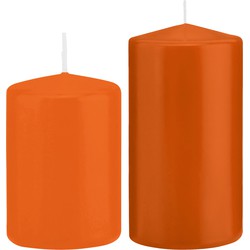 Stompkaarsen set van 2x stuks oranje 12 en 15 cm - Stompkaarsen