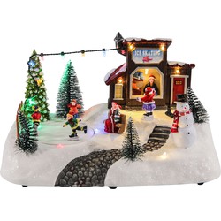 Kerstscene schaatsbaan m/beweging LED 28,5x18x16 cm 3xAA