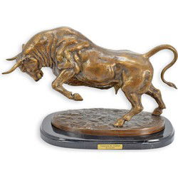 A BRONZE SCULPTURE OF A CHARGING BULL