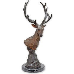 A BRONZE SCULPTURE OF A DEER HEAD